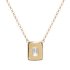 Look no further for the perfect every day necklace. This necklace is wonderful worn on its own or layered with others. An emerald cut diamond is nestled among a hand sculpted gold chunk.   The pendant is centered on a rolo chain which can be worn at 16" and 18".  14k yellow gold Lobster clasp closure Handcrafted in NYC