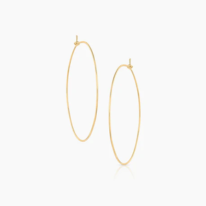 Introducing the petite little sister to the beloved Lola Hoops – the perfect blend of elegance and subtlety. Crafted from high-quality 14k gold or silver-filled lightweight wire, these hoops measure 2" in diameter, offering a refined, minimalist style that’s easy to wear every day. Whether you're dressing up for a night out or adding a touch of shine to your casual look, these hoops are designed to elevate any outfit with their delicate, yet striking presence. A must-have for those who love understated beau