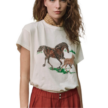 Load image into Gallery viewer, Woman wearing a t-shirt with horse design outdoors

