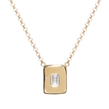 Load image into Gallery viewer, Look no further for the perfect every day necklace. This necklace is wonderful worn on its own or layered with others. An emerald cut diamond is nestled among a hand sculpted gold chunk.   The pendant is centered on a rolo chain which can be worn at 16&quot; and 18&quot;.  14k yellow gold Lobster clasp closure Handcrafted in NYC
