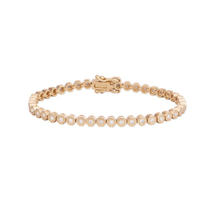 14K yellow tennis bracelet consisting of octagon-shaped sections each with a flush-set 2mm stone. * Available in Diamond and Light Pink Sapphire * Length: 6.5 inches * Total diamond carat weight: 1.6 ct * Gold weight: 13.0 g * Satin finish * Made in USA