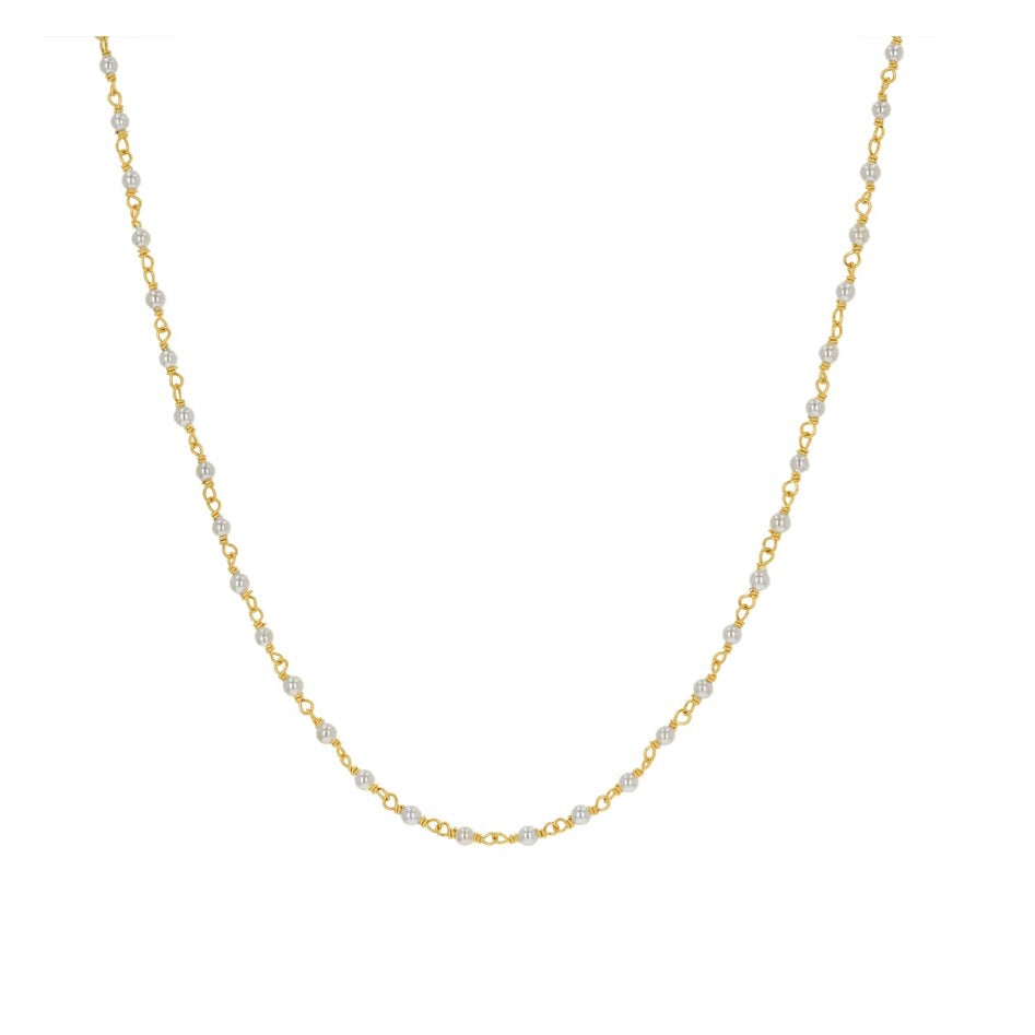 Simple and stunning, this necklace makes a great minimalist piece and is ideal for layering with other chains or necklaces.  14K Gold 16