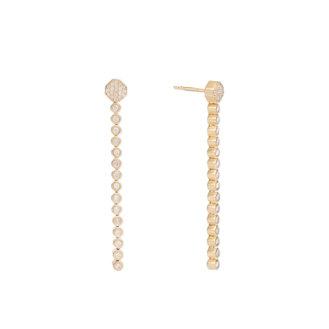 14K yellow gold octagon tennis earring with a diamond pave post and flush-set diamond dangle section. * Length: 2 inches * Total diamond carat weight: 0.60 ct * Gold weight: 7.35 g * Satin finish * Made in USA