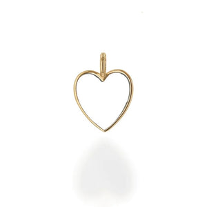 The pendant boasts a flawless white enamel finish that radiates purity and grace. Perfect foundation piece to start or add to your charm collection.  Heart is 0.7" long and 0.6" wide Chain sold separately 