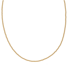 Load image into Gallery viewer, This chain has endless possibilities for styling. Wear it as a standalone statement piece, layer it with other necklaces and create your own signature look, or adorn it with your favorite pendant to personalize your style.  14K  Yellow Gold  1mm
