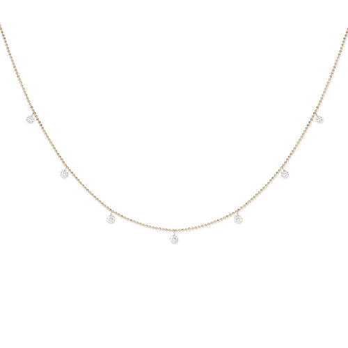 Seven drilled diamonds dangle from delicate 18K gold bead chain. * Adjustable length pulley closure, 18” at the longest * Available in 18K yellow or 18K white gold * Total diamond carat weight: 0.8 ct * Made in USA