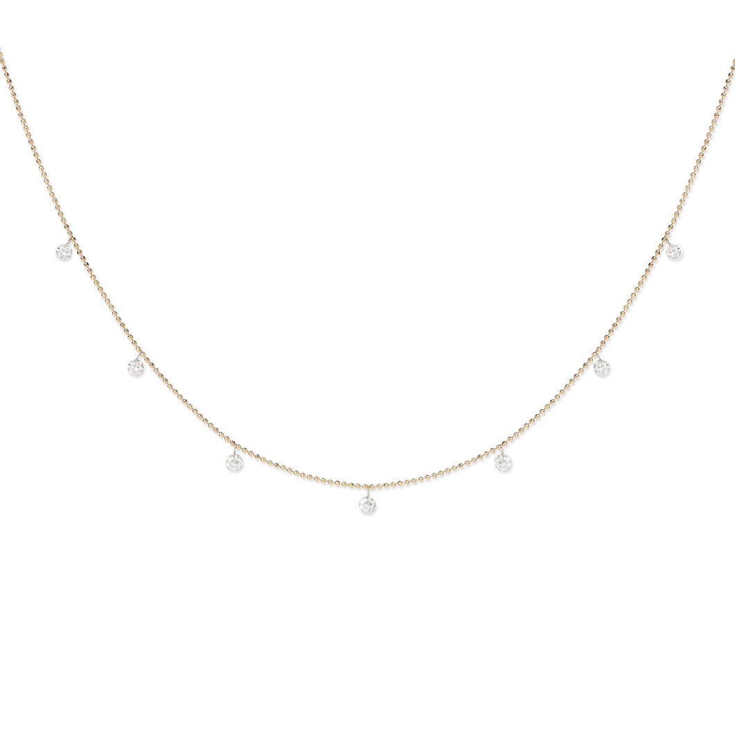 Seven drilled diamonds dangle from delicate 18K gold bead chain. * Adjustable length pulley closure, 18” at the longest * Available in 18K yellow or 18K white gold * Total diamond carat weight: 0.8 ct * Made in USA